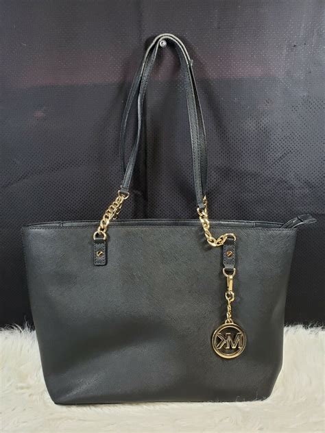 michael kors e-1606|Michael Kors outlet bag label.